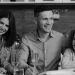 Smiling family enjoying quality time together at dining table in cozy kitchen.